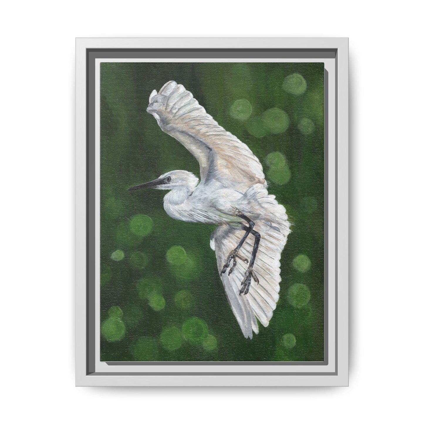 Framed Egret Canvas Art — White Egret Flying Over Green Bokeh
