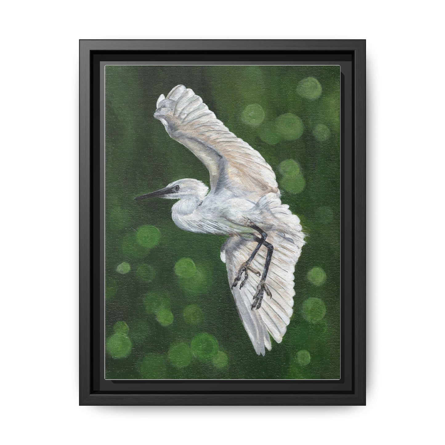 Framed Egret Canvas Art — White Egret Flying Over Green Bokeh