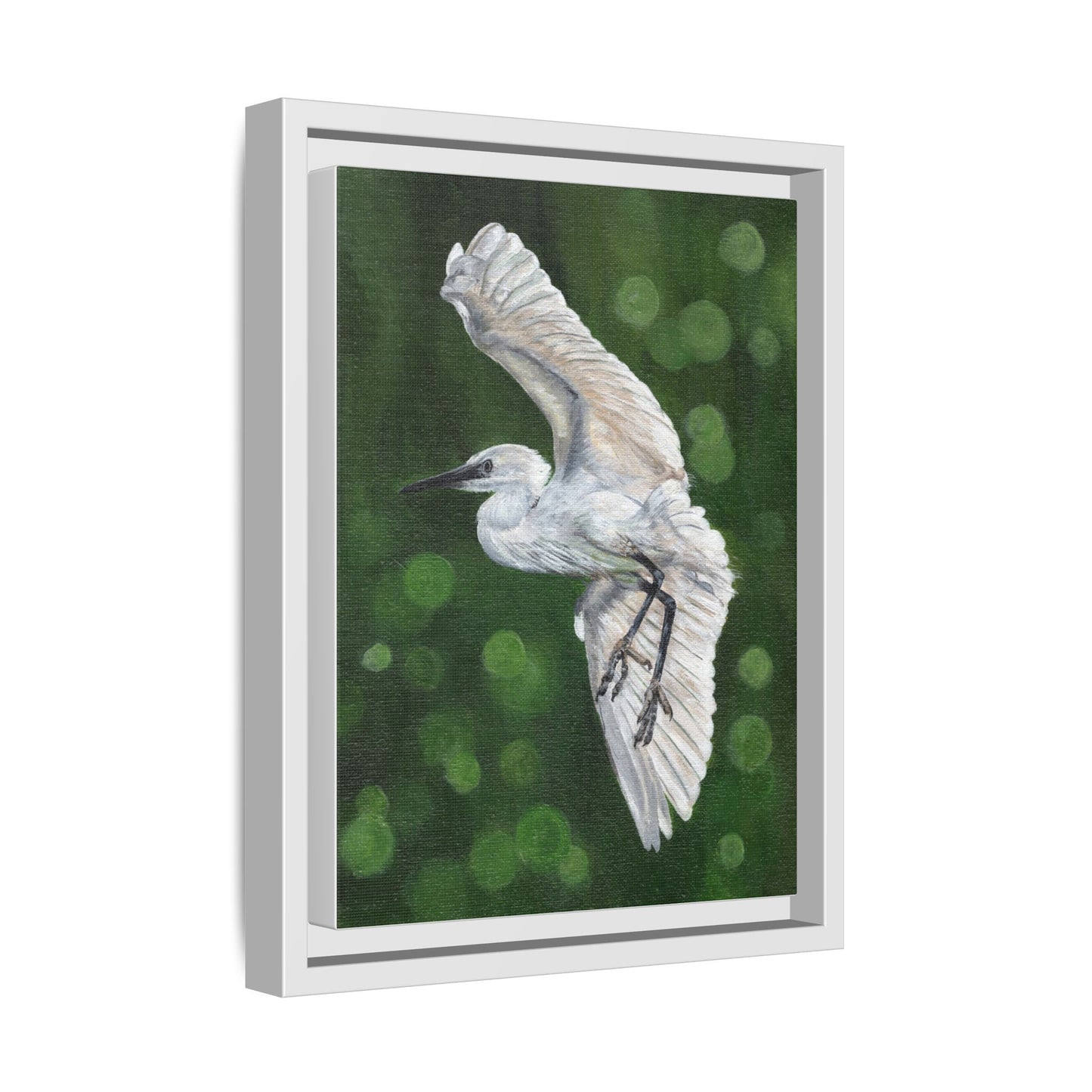 Framed Egret Canvas Art — White Egret Flying Over Green Bokeh